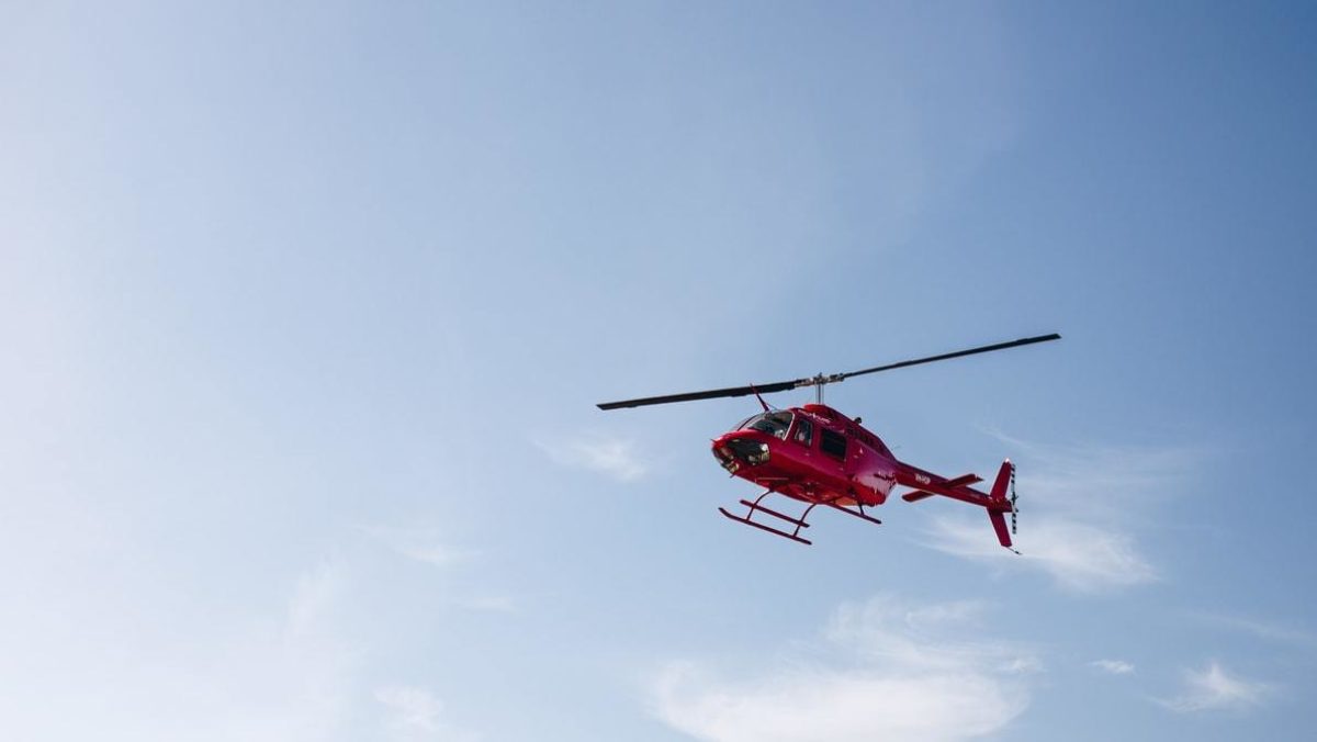 Red helicopter stock image